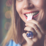 Just by incorporating sugar-free gum into your daily routine, you can significantly enhance your oral health. Chewing sugar-free gum stimulates saliva production, which helps neutralize acids produced by bacteria in your mouth, effectively reducing your risk of cavities and gum disease. Additionally, this simple habit can aid in freshening your breath and promoting a healthier overall oral environment. Discover how making this small change can lead to substantial benefits for your dental well-being. Key Takeaways: Chewing sugar-free gum stimulates saliva production, which helps neutralize acids, reduce the risk of cavities, and support enamel remineralization. Sugar-free gum can aid in reducing plaque buildup and promoting overall oral hygiene when used as a supplement to regular brushing and flossing. Chewing gum can also provide fresh breath, making it a convenient option for maintaining oral freshness throughout the day. The Science Behind Chewing Gum Your understanding of the science behind chewing gum can enhance your oral health routine. Chewing gum stimulates saliva production, which helps wash away food particles and neutralizes acids produced by bacteria in your mouth. This increased saliva flow can assist in preventing tooth decay and maintaining oral hygiene. Additionally, the act of chewing keeps your jaw muscles active, promoting overall dental health. Sugar-Free vs. Sugary Gum Behind the benefits of chewing gum lies a critical distinction: sugar-free versus sugary gum. Sugar-containing gum can contribute to tooth decay, whereas sugar-free options offer a healthier alternative that promotes oral health. By choosing sugar-free gum, you reduce the risk of cavities while enjoying the same satisfaction of chewing. Role of Xylitol and Other Sweeteners After understanding the differences, it’s necessary to explore the role of xylitol and other sweeteners in sugar-free gum. These ingredients are beneficial for your teeth and help inhibit the growth of harmful bacteria in your mouth. Xylitol, in particular, helps reduce levels of Streptococcus mutans, a cavity-causing bacterium, thereby promoting overall dental health. "When choosing sugar-free gum, look for xylitol as a key ingredient—it not only fights cavity-causing bacteria but also disrupts bacterial growth cycles, offering a double layer of protection for your teeth." - Dr. Khaja Siddiqui It’s important to note that xylitol is a natural sugar alcohol that offers significant benefits for oral health. Not only does it help in preventing cavities by reducing harmful bacteria, but it also encourages the remineralization of tooth enamel. Additionally, other sweeteners, like sorbitol and mannitol, serve a similar purpose without the harmful effects associated with sugar. Incorporating gum with xylitol into your routine can be a simple yet effective strategy for maintaining a healthy mouth. Saliva Production and Its Importance One of the key roles of saliva in your mouth is to aid in the digestion process and maintain oral health. Saliva helps to neutralize acids produced by bacteria in your mouth, reducing the risk of tooth decay and gum disease. Additionally, saliva contains essential minerals such as calcium, phosphate, and bicarbonate, which are vital for protecting and remineralizing tooth enamel. When saliva production decreases, you may experience dry mouth, which can lead to various oral health issues, highlighting the importance of keeping saliva levels optimal. How Chewing Gum Stimulates Saliva Flow Below, you'll discover that chewing sugar-free gum effectively stimulates saliva flow. The act of chewing enhances oral muscle movement and triggers your salivary glands to produce more saliva. This increased saliva helps wash away food particles, neutralize acids, and keep your mouth feeling fresh, ultimately contributing to better oral hygiene. Benefits of Increased Saliva in Oral Health Flowing saliva provides numerous benefits for your oral health. With increased saliva production, you help create a natural defense against cavities and gum disease. "Saliva is your mouth’s natural repair system—it neutralizes harmful acids and replenishes essential minerals that make your enamel stronger and more resistant to decay." - Dr. Khaja Siddiqui The saliva washes away food particles and bacterial plaque from your teeth, making it a crucial component in maintaining oral hygiene. Furthermore, saliva aids in remineralizing enamel, fortifying your teeth against decay and helping prevent the onset of conditions like tooth sensitivity and bad breath. It's clear that keeping your mouth moist with optimal saliva levels is imperative for overall dental wellness. Stimulating saliva production combats issues like dry mouth and enhances health in various ways. When you chew sugar-free gum, the increased saliva flow helps flush away harmful bacteria and food debris, reducing the risk of plaque buildup. Saliva is also rich in imperative minerals that contribute to the rebuilding and strengthening of tooth enamel. Maintaining a healthy level of saliva in your mouth is vital in preventing oral infections and promoting a brighter, healthier smile. By integrating sugar-free gum into your routine, you take a proactive step toward better oral health. Plaque Reduction and Tooth Decay Prevention For maintaining your oral health, chewing sugar-free gum can significantly reduce plaque buildup and prevent tooth decay. The act of chewing stimulates saliva production, which helps neutralize acids produced by bacteria in your mouth. "A healthy flow of saliva does more than just rinse your mouth—it also carries important enzymes and minerals that bolster your teeth’s defenses against decay, making it one of the most effective natural tools for oral hygiene." - Dr. Khaja Siddiqui This increased saliva flow washes away food particles and contains minerals that can strengthen your enamel, providing a natural defense against cavities. Mechanisms of Action in Plaque Control The process by which sugar-free gum aids in plaque control involves several mechanisms. Chewing gum increases saliva production, which dilutes and washes away harmful bacteria and food debris. Saliva is rich in bicarbonate, calcium, and phosphate that help to remineralize enamel and inhibit the growth of acid-producing bacteria. By engaging in this simple habit, you can effectively reduce the chances of plaque formation on your teeth. Evidence from Recent Studies A recent meta-analysis highlighted that chewing sugar-free gum for at least 20 minutes after meals can significantly decrease plaque formation. Studies have shown that participants who incorporated sugar-free gum into their oral hygiene routine experienced a significant decrease in plaque accumulation compared to those who did not. A 2020 meta-analysis and FDI World Dental Federation report indicated that chewing sugar-free gum for 20 minutes after meals can significantly reduce plaque formation and support enamel remineralization. Participants demonstrated a *notable reduction* in both plaque scores and cavity development. The studies suggested that the increase in saliva not only decreases acidity but also assists in the *remineralization of enamel*, reinforcing your teeth’s defense against decay. By choosing to chew sugar-free gum regularly, you can enjoy a *healthier mouth* and *minimize your risk* of dental issues. Freshening Breath and Its Impact on Confidence Many individuals underestimate the power of fresh breath in enhancing their social interactions. When you have fresh breath, you feel more at ease, allowing you to speak confidently and engage with others without the fear of unpleasant odors affecting their perception of you. This added confidence can significantly improve your personal and professional relationships. How Gum Affects Breath Odor On chewing sugar-free gum, you activate your salivary glands, producing saliva that helps wash away food particles and neutralize acids in your mouth. This action not only combats bad breath but also contributes to the overall cleanliness of your mouth, leaving a pleasant flavor that lingers long after you’ve finished chewing. Psychological Benefits of Fresh Breath Behind having fresh breath lies a host of psychological advantages. When you know your breath smells good, you’re more likely to engage in conversations, smile more, and project a positive self-image. This self-assured demeanor can foster stronger connections with others, contributing to a more fulfilling social life. And as you cultivate fresh breath, you pave the way for enhanced self-esteem and social interactions. Surveys suggest that individuals who perceive their breath as fresh report greater confidence and comfort in social situations. Moreover, frequent gum chewing can become a positive habit that reinforces your commitment to maintaining good oral hygiene, further boosting your confidence in various settings. Chewing Gum and Oral Hygiene Habits All your oral hygiene routines can be complemented by chewing sugar-free gum. This simple habit can help reduce plaque buildup, enhance saliva production, and neutralize harmful acids in your mouth. Moreover, when used alongside regular brushing and flossing, sugar-free gum can further promote a healthier oral environment, ultimately contributing to reduced risk of cavities and gum disease. Supplementing Regular Dental Care For optimal oral health, incorporating sugar-free gum into your daily routine can supplement your regular dental care. While it should never replace brushing and flossing, chewing gum can effectively aid in cleaning teeth and freshening breath between these important practices. Opt for products containing xylitol, as this ingredient actively helps reduce harmful bacteria in your mouth. Encouraging Healthy Habits in Children Before introducing chewing gum to your child, consider its potential benefits in promoting oral hygiene. Chewing sugar-free gum can reinforce positive dental habits, turning a fun activity into a learning opportunity. This can help keep your child's smile healthy while motivating them to develop a routine that emphasizes dental care. Supplementing your child's oral hygiene routine with sugar-free gum can instill *healthy habits* early on. By offering gum after meals, you can teach them the importance of maintaining oral cleanliness while making it enjoyable. This small change can lead to a lifetime of *good practices*, helping to reinforce that good oral health doesn't have to be a chore but can be fun and rewarding instead. Potential Drawbacks and Considerations Unlike other oral care methods, chewing sugar-free gum may come with some drawbacks that should not be overlooked. Frequent gum chewing can lead to jaw discomfort or exacerbate conditions like temporomandibular joint disorder (TMJ). It's important to be aware of the potential impact on your oral and overall health, particularly if you have existing jaw or dental issues, which could be aggravated by excessive use of gum. Possible Side Effects of Excessive Chewing An increase in the amount of time you spend chewing gum can lead to side effects such as jaw pain, headaches, and gastrointestinal discomfort. Excessive chewing can strain the muscles around your jaw, potentially worsening symptoms of temporomandibular joint (TMJ) dysfunction and causing headaches or tension. It’s important to balance gum chewing with other oral health practices to avoid these complications. Recommendations for Safe Gum Chewing For a safe and enjoyable gum-chewing experience, limit your consumption to a moderate amount each day. Chewing sugar-free gum for about 20 minutes after meals can be beneficial for your oral health, while extended chewing sessions should be avoided to prevent jaw strain. Due to the potential side effects of excessive gum chewing, you should aim to limit your intake to short periods throughout the day. Choosing sugar-free varieties aids in cavity prevention, but it's best to chew for no more than 20 minutes at a time, up to a few times per day, to prevent jaw strain. If you start experiencing jaw pain or discomfort, consider reducing your intake and consult a dental professional for personalized advice. By following these guidelines, you can enjoy the oral health benefits of sugar-free gum while keeping potential issues at bay. To wrap up With these considerations, incorporating sugar-free gum into your oral health routine can provide significant benefits. Not only does it help in reducing plaque and preventing cavities, but it also promotes saliva production, which is crucial for maintaining a healthy mouth. By choosing sugar-free options, you can enjoy the refreshing flavor while actively contributing to your oral hygiene. So, the next time you chew gum, consider its impact on your dental health and make it a beneficial addition to your daily habits. Chewing sugar-free gum is just one way to support your oral health — but regular dental checkups are essential too. If you have questions about your oral hygiene routine or want Our friendly team at Sudbury Dental Clinic is here to provide personalized recommendations and help you. Contact us today to book your appointment and keep your smile in top shape! Reviewed by: Dr. Khaja Siddiqui